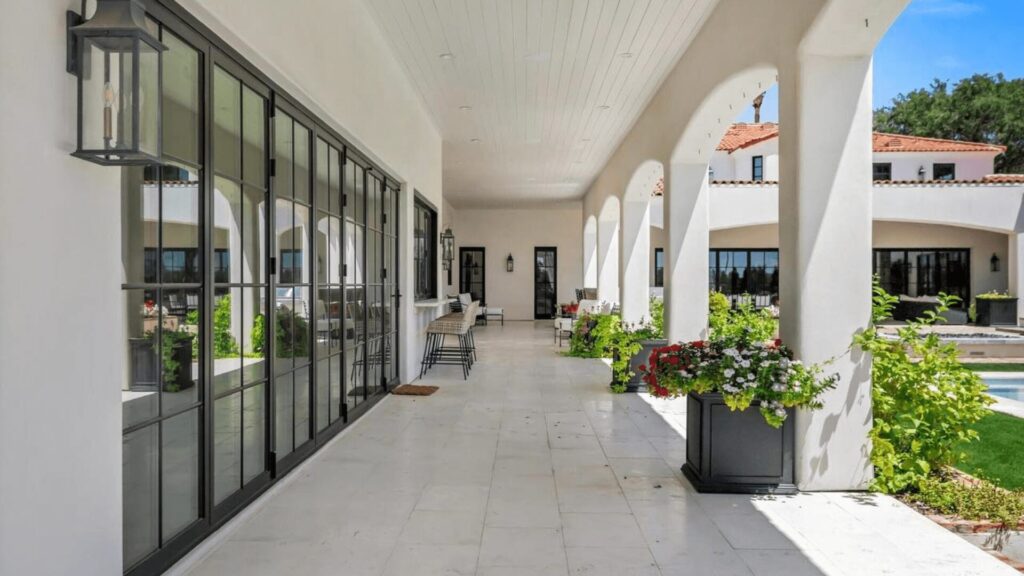 outdoor patio and backyard of a Mediterranean style home